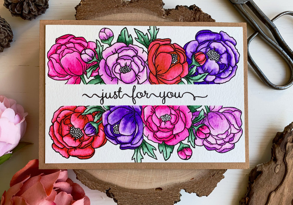 Handmade card for Mother's day with a greeting in the middle saying Just For You and peony flowers stamped above and below it. The flowers were coloured with the Zig brush markers in pink, purple and red.