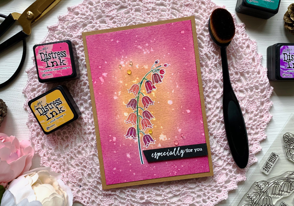Quick card using Distress inks to create a pink and yellow background, with stamped and heat embossed background in white. 
