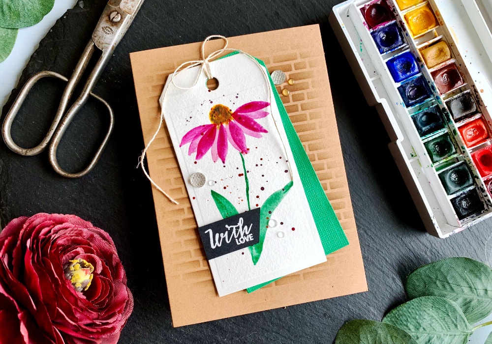 Make a simple handmade card with a watercolour coneflower. You can die-cut a tag or adhere your watercolour panel directly onto the card base. Add some embellishments and the card is finished.