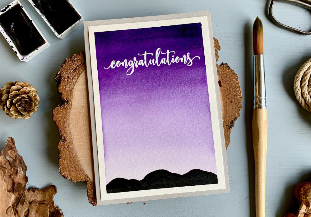 Make a very simple and quick DIY card with a sky with the ombre effect and silhouette of mountains. This card is budget friendly, perfect for beginners.