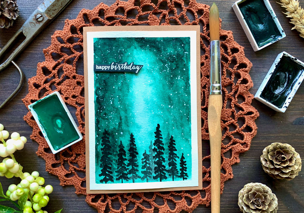 Learn how to paint a very simple watercolour galaxy or aurora background using only one colour and create a beautiful handmade card. Galaxy watercolour background perfect for beginners!