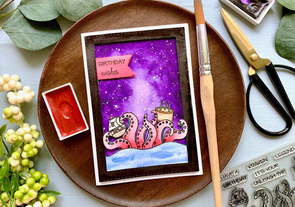 Paint a very simple watercolour galaxy background using only one colour and create a fun masculine card. Galaxy background perfect for beginners!