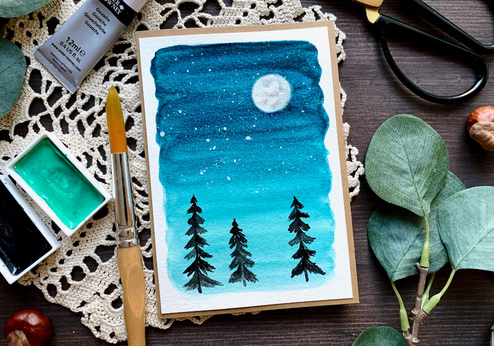 Learn how to paint a very simple night sky with stars, moon and silhouette pine trees and make a beautiful card. Perfect for beginners. - - #WatercolourNightSkyTutorial #EasyWatercolourNightSky #WatercolourNightSkyForBeginners