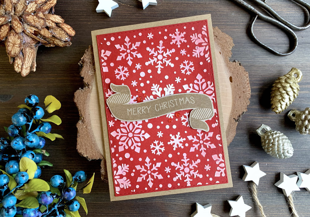 Handmade greeting Christmas greeting cards showcasing seven types of different backgrounds you can created using Distress inks or other similar inks