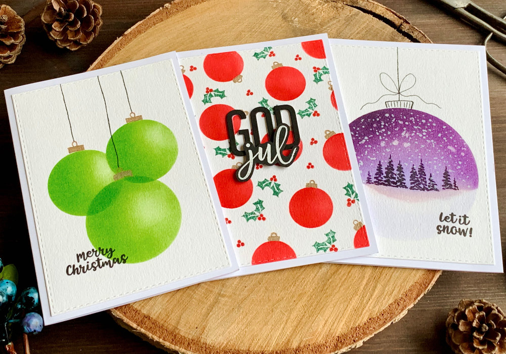 Handmade Christmas cards with baubles  created with Distress inks and a (DIY) circle stencil. Make overlapping baubles, baubles background or a landscape within a bauble.