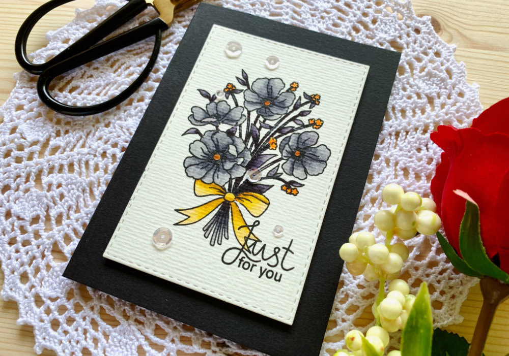Handmade card with bouquet of flowers coloured in greyswith Zig Brush Markers without water.