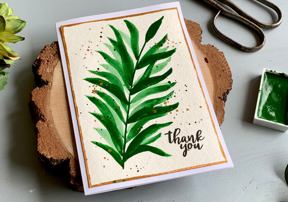 DIY Thank You card with hand-painted leaf using green watercolours. 