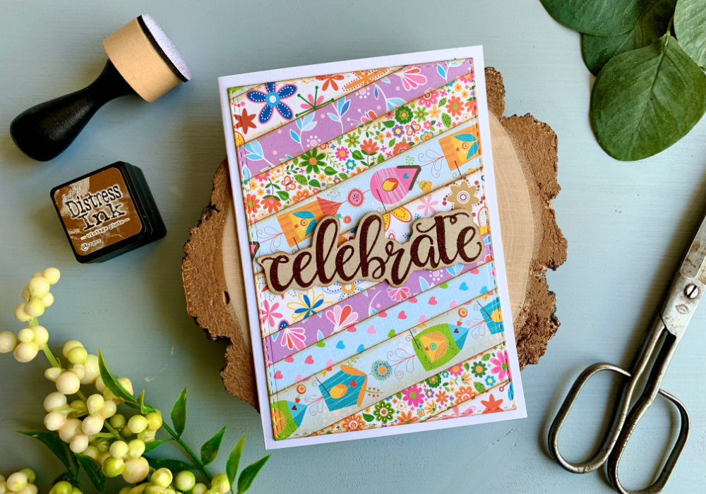 Use brown Distress inks such as Walnut Stain or Vintage Photo to help pattern papers blend better. Just apply the ink along the edges and when you join the papers they will blend more seamlessly.