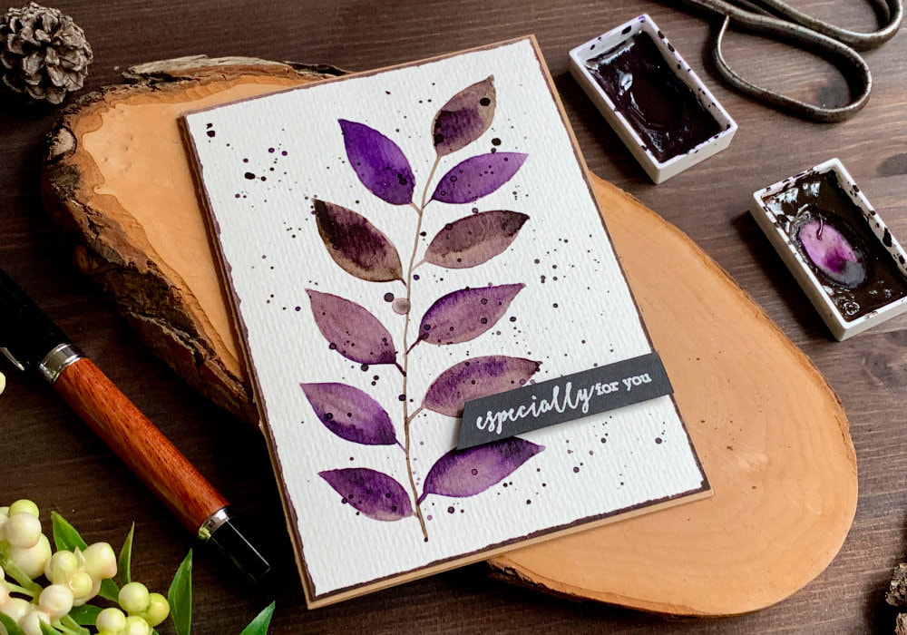 DIY Birthday greeting card with watercolour leaves in brown and purple shades and greeting saying Especially For You.