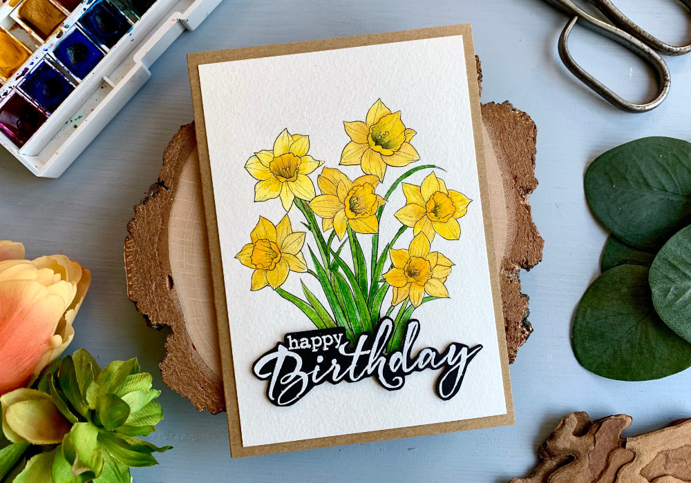 Handmade greeting card for Birthday or Mother's day with daffodils digital stamp printed on a watercolour card stock and coloured with watercolours.