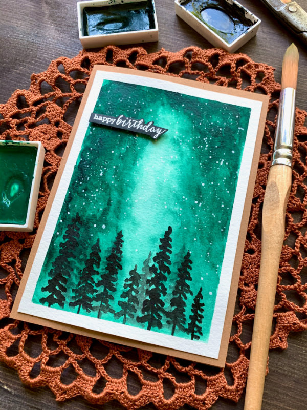 Learn how to paint a very simple watercolour galaxy or aurora background using only one colour and create a beautiful handmade card. Galaxy watercolour background perfect for beginners!