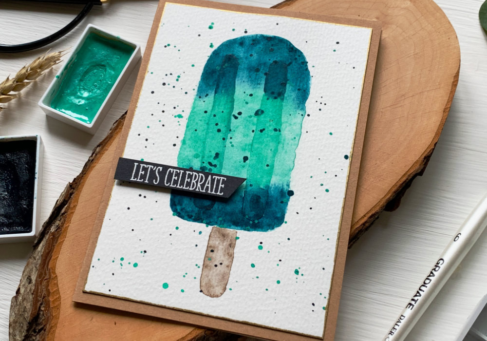 Handmade card with a watercolour ice lolly, mint in the middle and turquoise at the top and the bottom.