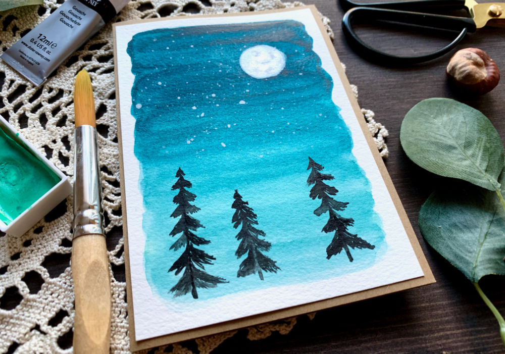 Learn how to paint a very simple night sky with stars, moon and silhouette pine trees and make a beautiful card. Perfect for beginners.