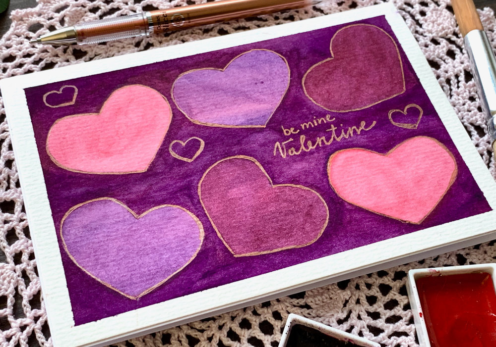 Very pink and handmade Valentine's Day card with six hearts, using watercolours and painting a layered negative space background with hearts.  
