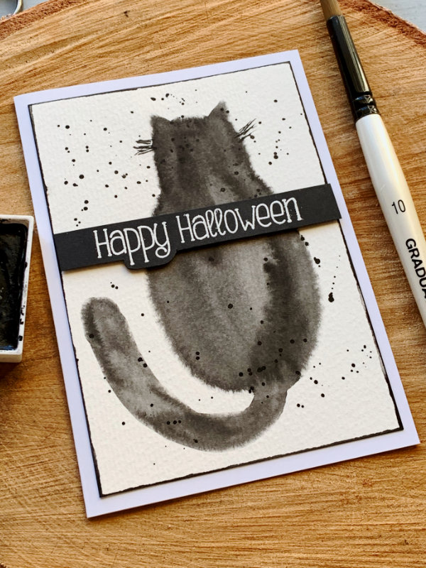 Paint a very simple black cat using watercolours and the wet on wet technique and creating a quick and easy DIY Halloween card.