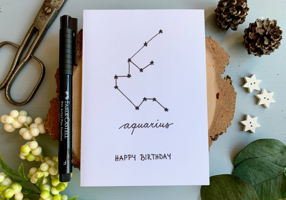 Handmade card with the Zodiac star sign - Aquarius, perfect for beginners using minimal supplies - a card base, black fine liner, pencil and an eraser.