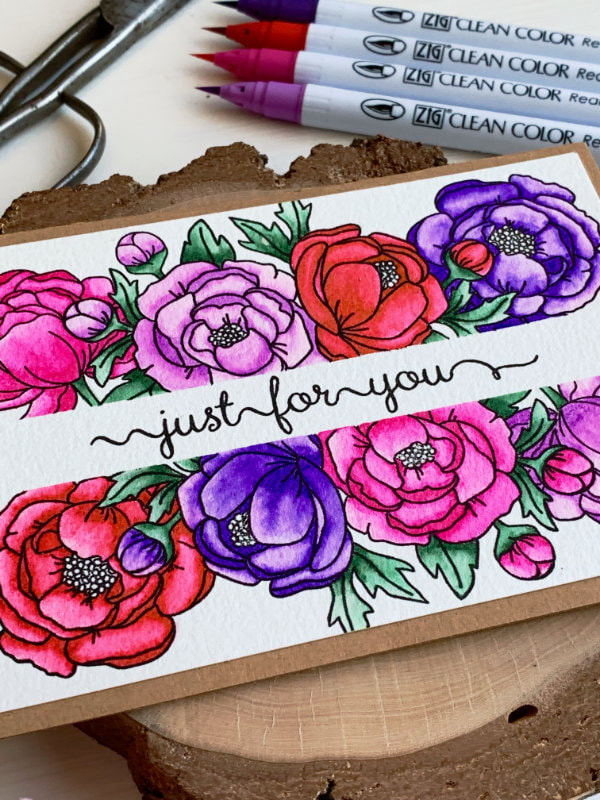 Handmade card for Mother's day with a greeting in the middle saying Just For You and peony flowers stamped above and below it. The flowers were coloured with the Zig brush markers in pink, purple and red.