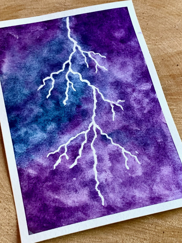 Watercolour sky with a lightning.