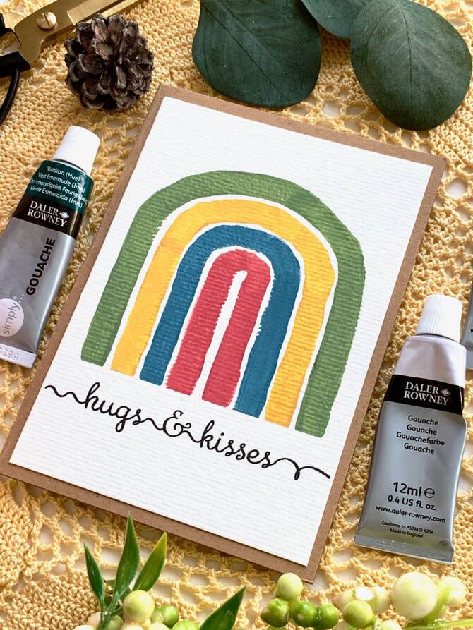 DIY greeting cards with modern handpainted rainbwos in pastel colours. 