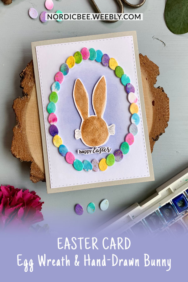 Create a fun and cute Easter card with a hand-drawn and watercolour bunny as the focal point within an Easter egg wreath using small Easter dies.
