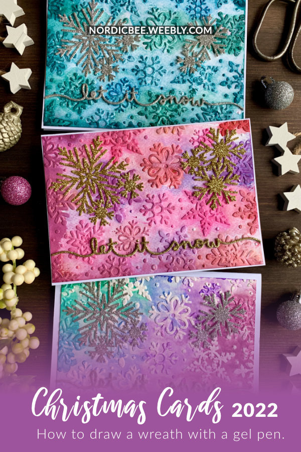 Handmade sparkly Christmas cards with an embossed snowflake background doing an embossing folder watercolour technique using Nuvo Shimmer powders, regular watercolours as well as Distress ink pads.