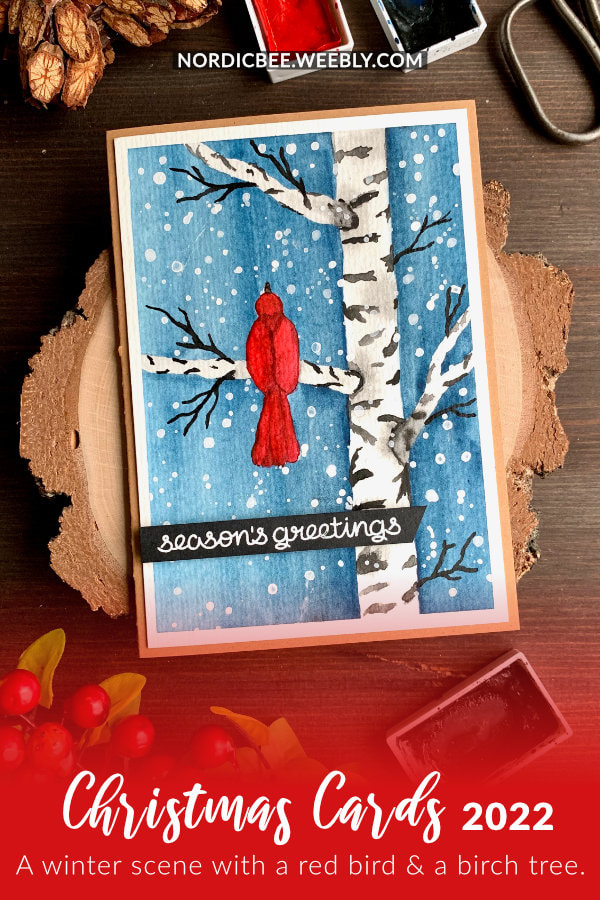 Learn how to draw and paint a simple winter scene with a red bird and birch tree using watercolours and make a DIY Christmas card.