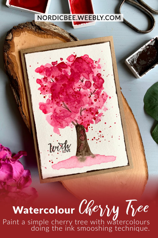 Make a simple DIY greeting card with a watercolour cherry tree created with the ink smooshing technique. 