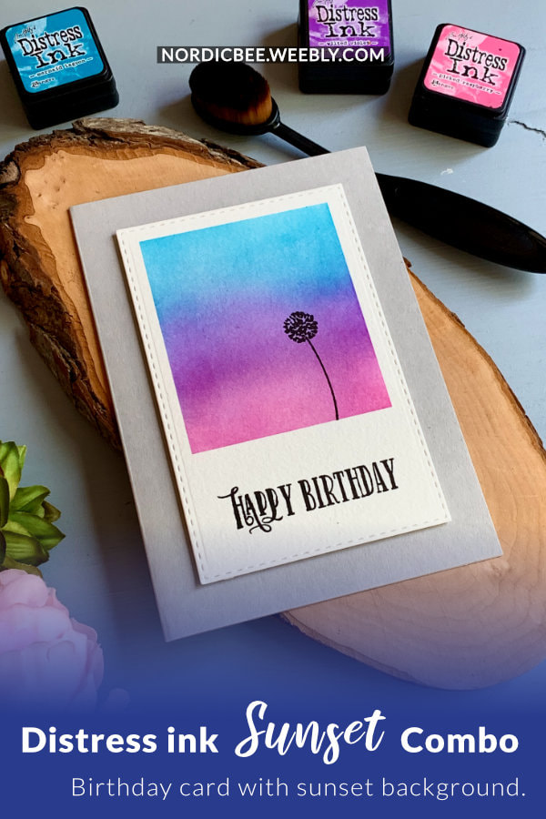 Quick and easy handmade Birthday card with a very simple Distress ink blending combination for a sunset sky, using the inks Mermaid Lagoon, Wilted Violet and Picked Raspberry, blended on a Polaroid shape panel.