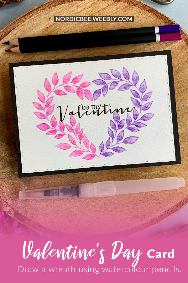 Make a simple DIY Valentine's Day card with a wreath in a shape of a heart using inexpensive watercolour pencils.