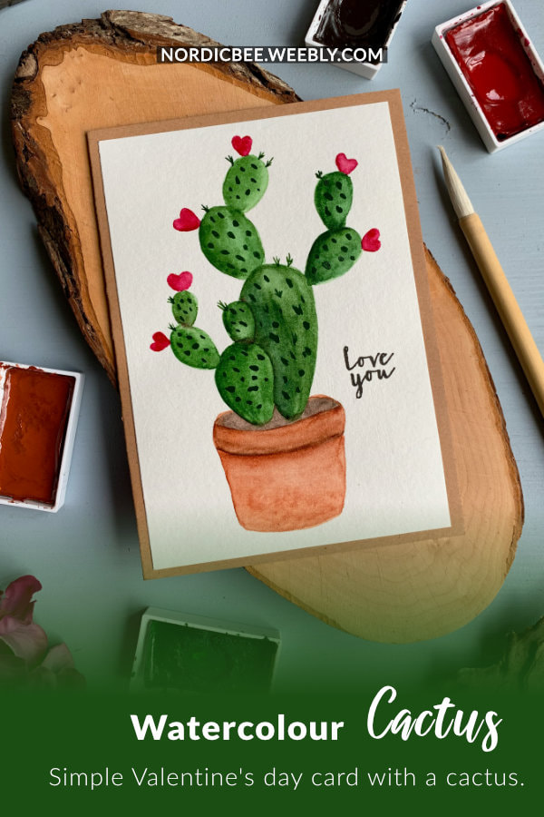 Simple handmade card for Valentine's day or anniversary with a watercolour cactus and hearts instead of flowers.