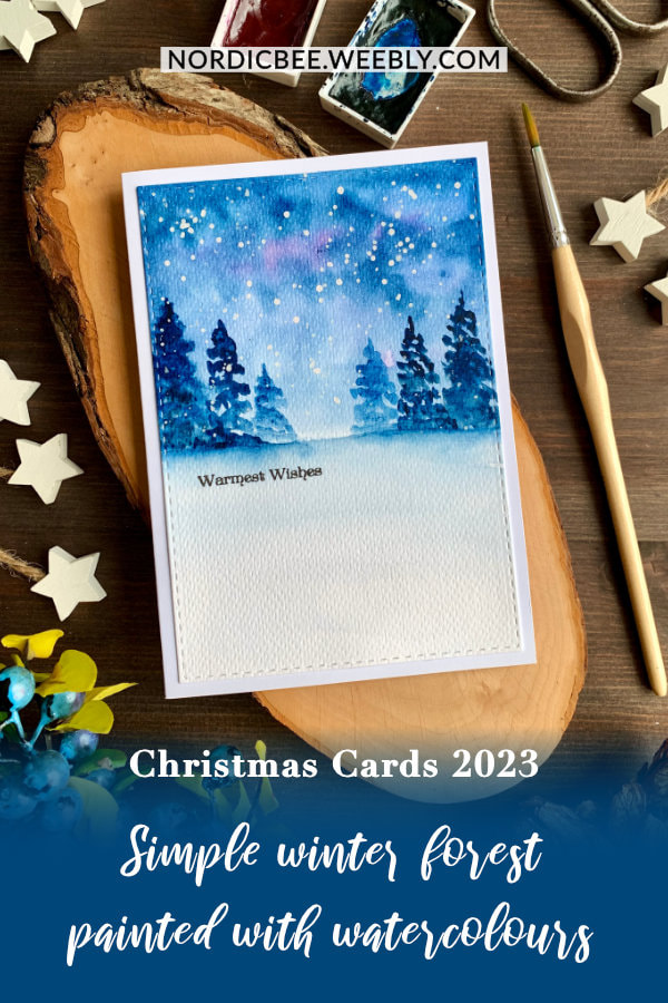 Make a simple Christmas card with a watercolour winter forest scene at night.