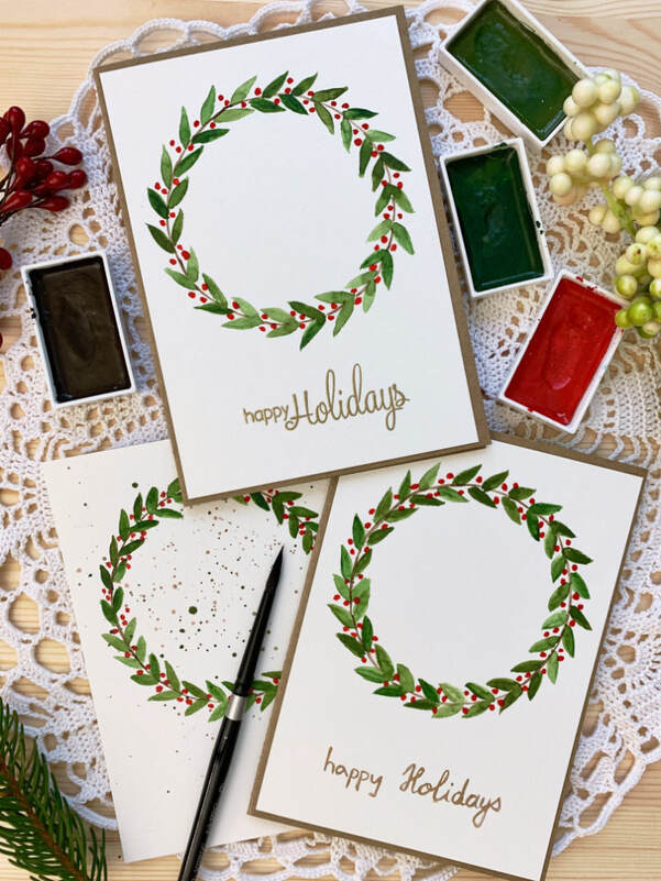 Learn how to paint a very simple watercolour Christmas wreath, even if you are a beginner and have never painted a wreath before and create a beautiful handmade Christmas card to give to your friends and family. Watercolour tutorial with a very simple Christmas wreath. Handmade Christmas card with a very basic Christmas wreath.