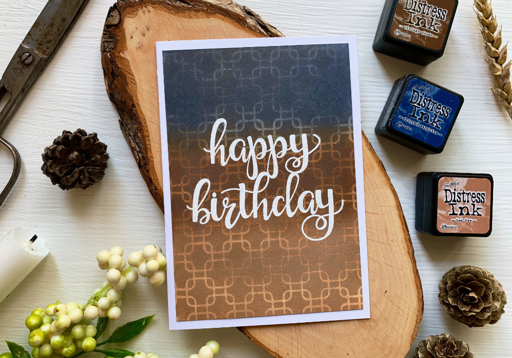 Make a very simple Happy Birthday handmade card by creating a quick and easy background with a stencil and cool Distress ink blending combination - Tea Dye, Vintage Photo and Chipped Sapphire. 